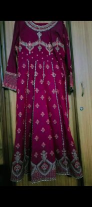 i am selling a very attractive maroon colour dress.