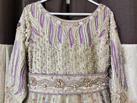 Custom made hardly used golden and purple heavy party dress in an excellent condition